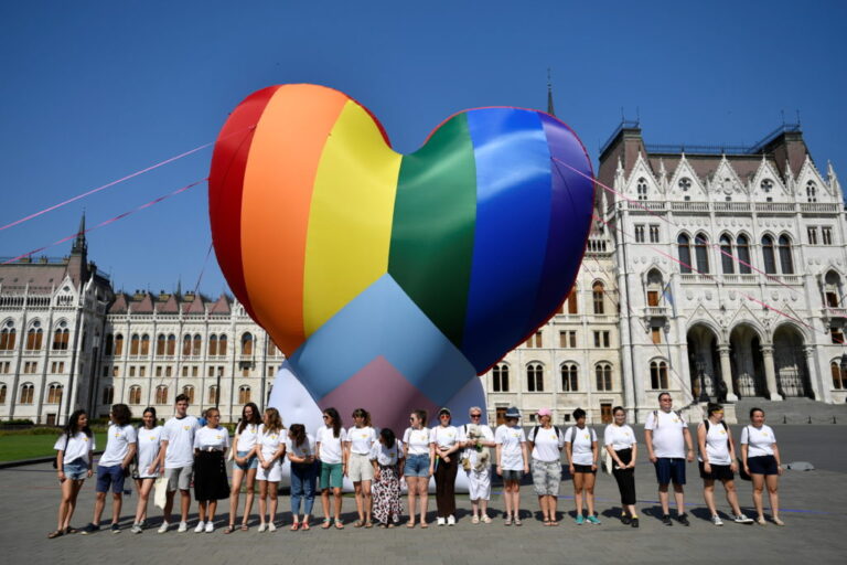 NGOs fly huge rainbow balloon at Hungary's parliament protesting against anti-LGBT law in Budapest